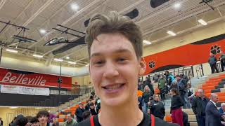 Nassim Mashhour and the Dearborn boys basketball team reacts to 46-44 win over Belleville