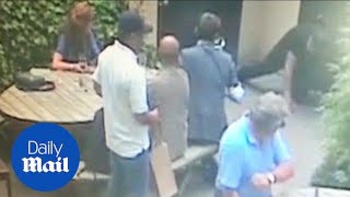 Shameless robber: CCTV captures man stealing gems worth £35k - Daily Mail