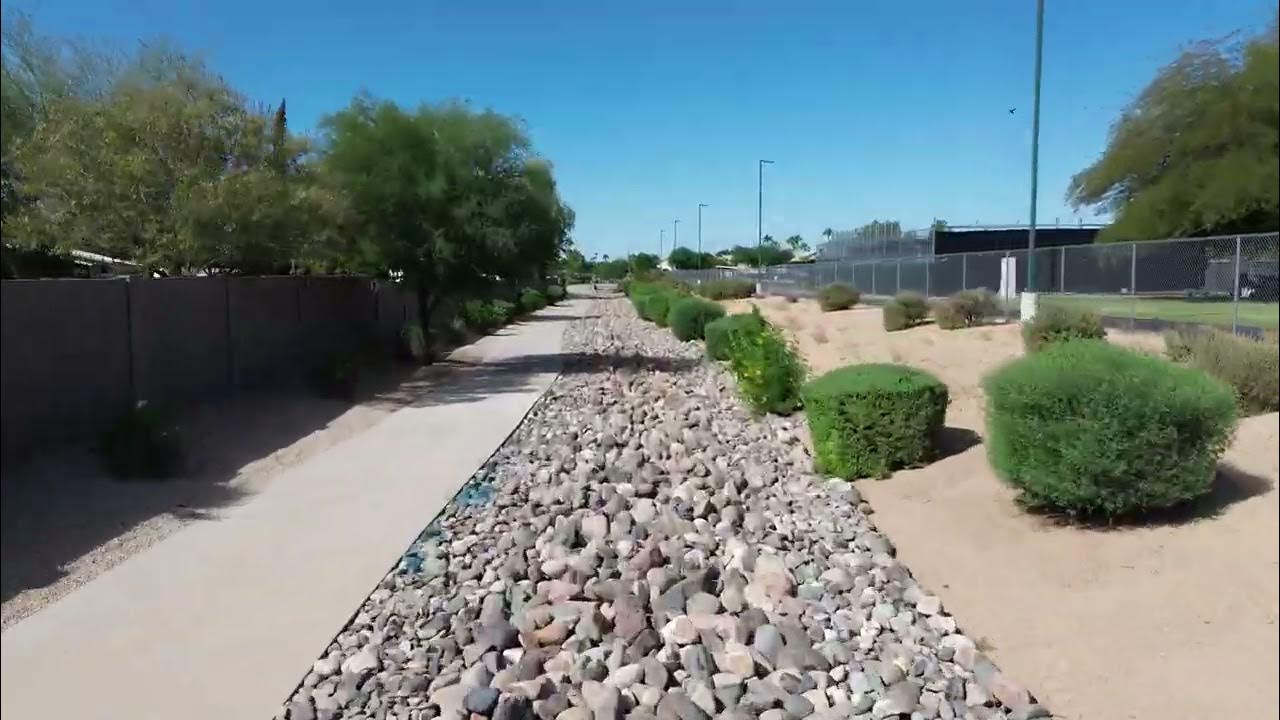 Walking path river rock installation - YouTube