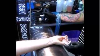 Julie's first tattoo 18/12/2014 Double Infinity on wrist