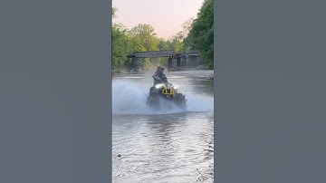 Can-Am Renegade riding in river