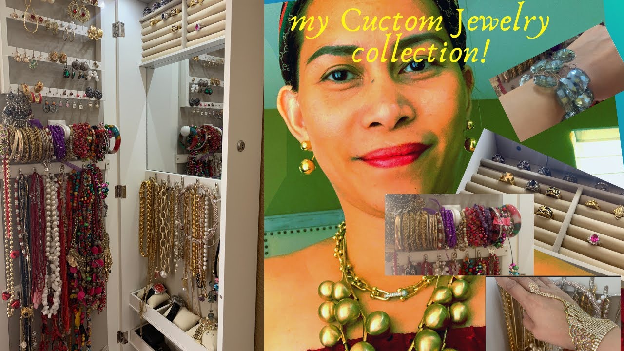 Custom Jewelry Collection with Wall Mounted Jewelry Armoire with Mirror.