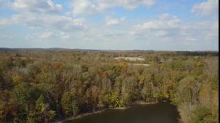 Free 4K Aerial Stock Footage of lake trees and farmland @Videezy