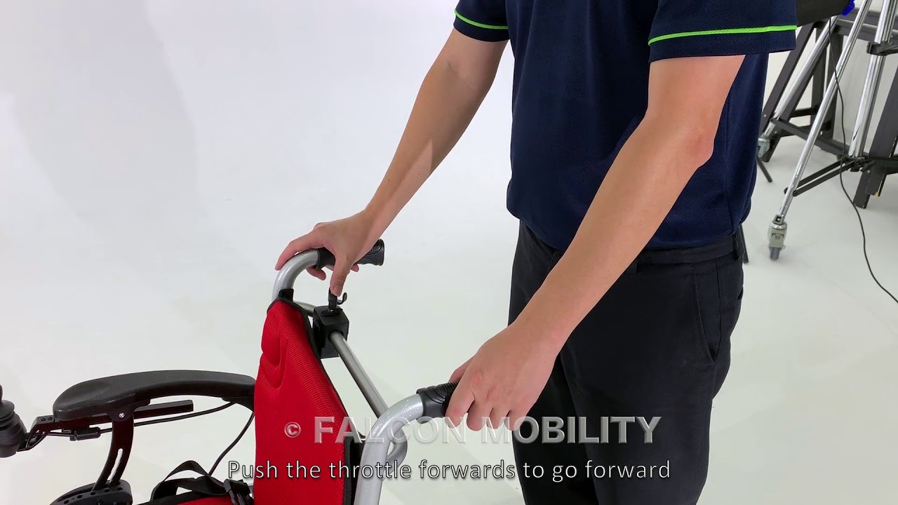 Ultra-Lite Electric Wheelchair - Pushing and using Attendant Control