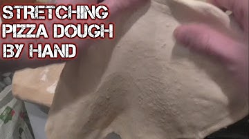 Stretching Pizza Dough By Hand No Rolling Pin Needed