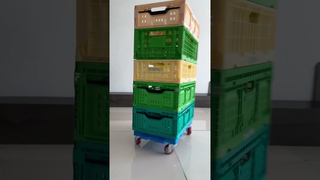 Collapsible Plastic Crates Spinning on a Dolly 