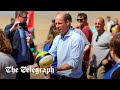 Prince William plays volleyball during Cornish beach visit