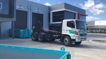 Choice Bins Hire - Loading Skip Bin onto truck