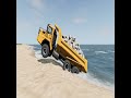 A large rock truck was backing up to dump rocks on the beach when it collapsed 2