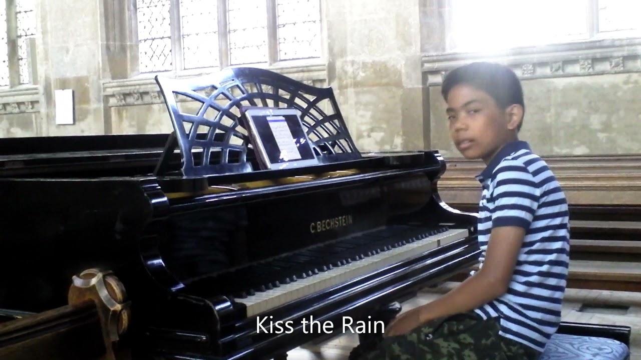 James Barker playing the Piano at Lavenham church, Suffolk.
