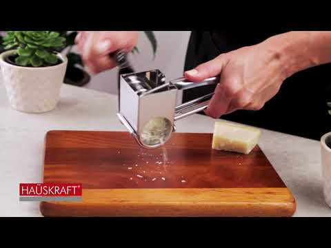 Vídeo: Ralador rotativo mecânico - um ajudante prático na cozinha