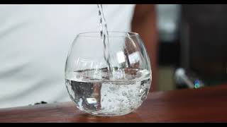 Pouring Water in Drinking Glass