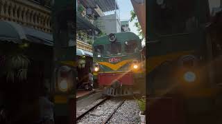Train Passing through the Famous Train Street