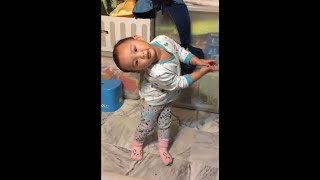 Baby happily sings and dances