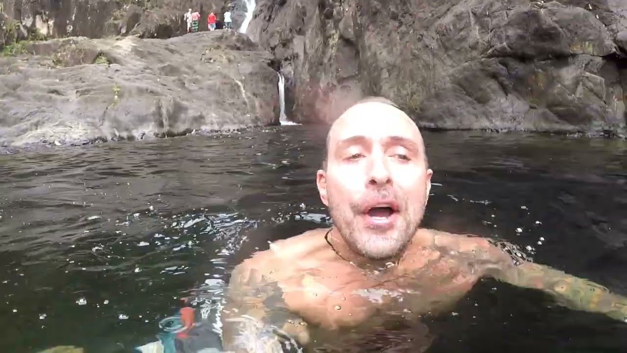 Nice swim in cold  pool bottom of waterfall,Koh Chang, Thailand 