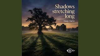 Shadows stretching long in the dying light