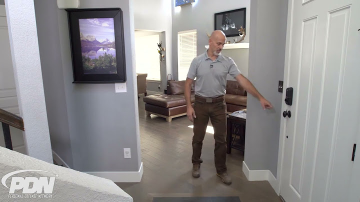 STAGING HOME DEFENSE GUNS NEAR AN ENTRYWAY