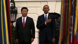Obama vows 'candid' talks with China's Xi, raises rights