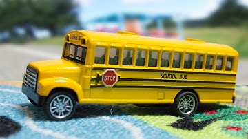 The wheels on the Bus go round and round nursery rhyme - Fun Songs for Children