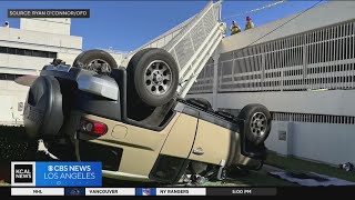 Driver's misstep sends an SUV plunging off parking structure
