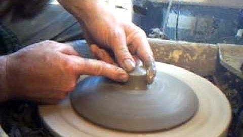 SIMON LEACH - putting knob on casserole  lid  27-6-07