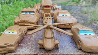 Disney Pixar Cars fall into the water: Lightning McQueen, Miss Fritter, Mater