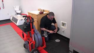 How to set up the RIDGID K7500 drum machine for operation