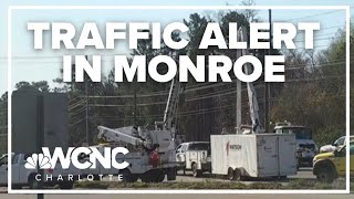 All lanes shut down at US 74 and 601 South after crash takes down power lines
