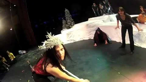 Fond du Lac High School student practice an epic battle scene from their play