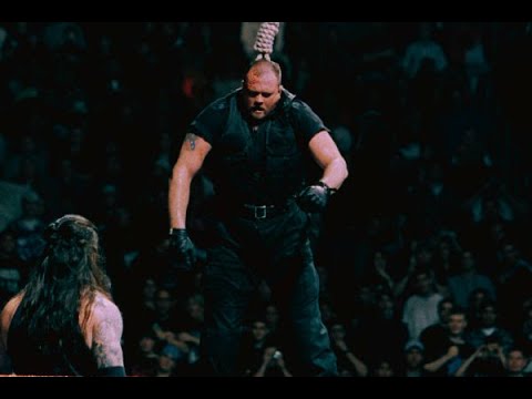 The Undertaker Hangs Out The Bossman In The Middle Of The Ring