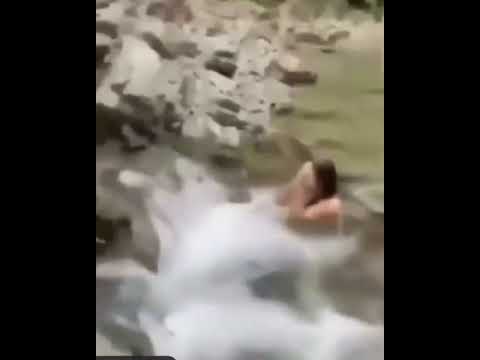 Man pee’s into the water while a woman is drinking it.