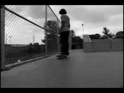 Tyler Kirkpatirck on a Skateboard in summer