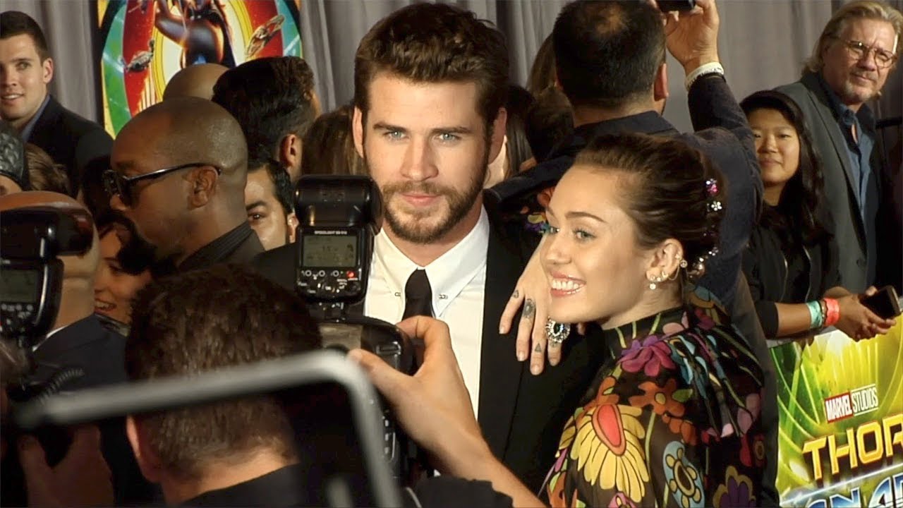 Miley Cyrus and Liam Hemsworth "Thor: Ragnarok" World Premiere Red