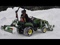 John deere 1023E Winter, Loading snow