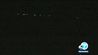 It's not aliens. from california to the east coast, sky gazers
reported seeing a string of unusual lights in monday evening. full
story: https://abc7...