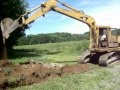 Cat 215 B Digger Excavator.wmv