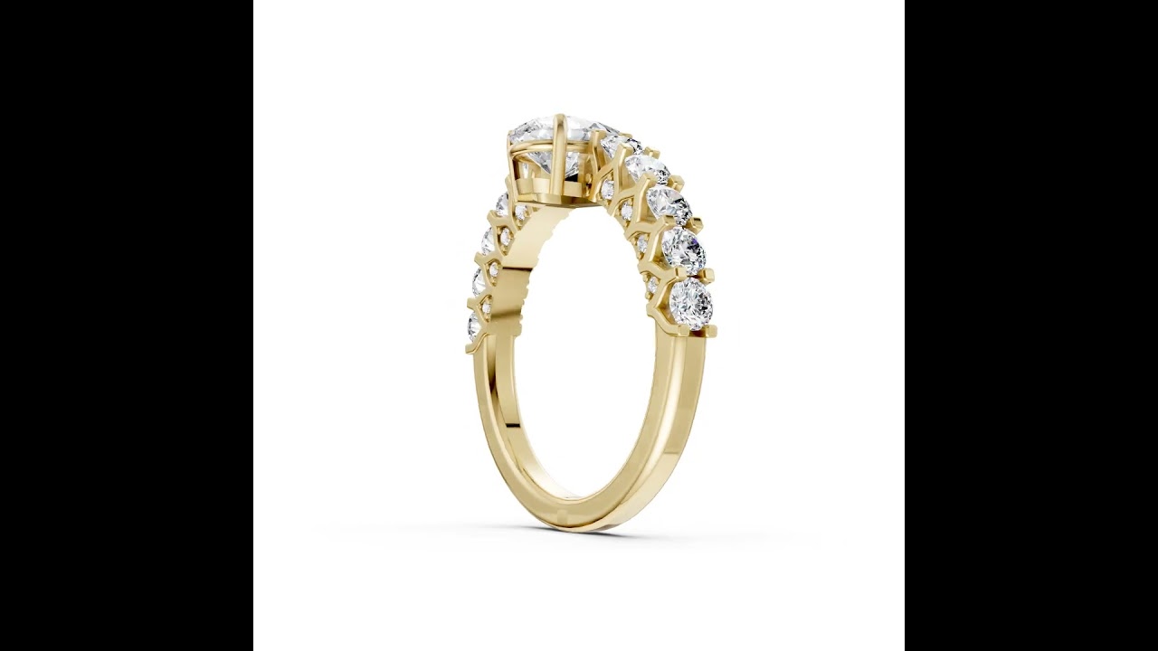 Pear Cut Diamond With Scalloped Graduated Shank Ring
