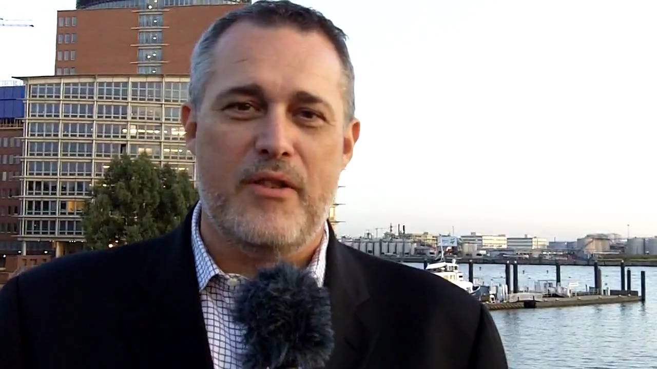 Kodak CMO Jeffrey Hayzlett greets couchhopper Daniel Hopkins on Kodak