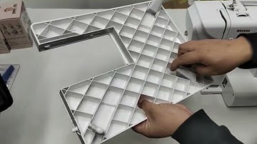 How to install an extension table on a household embroidery machine