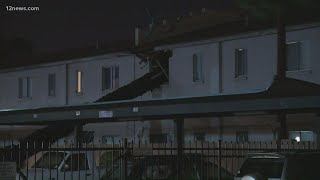 Man narrowly escapes after tree falls on apartment during Phoenix storm