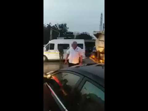 Former Ghanaian President, Jerry Rawlings, Steps Out Of Car To Control Traffic