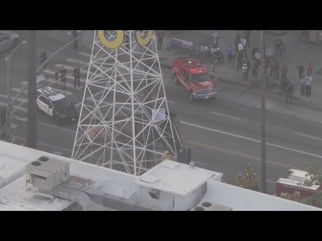 Why is Free Billie Eilish trending? Unnamed man climbs Hollywood Tower to  deliver message, netizens are amused