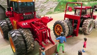 RC TRUCK pick up RC TRACTOR to change the MONSTER WHEELS - farm toys in action