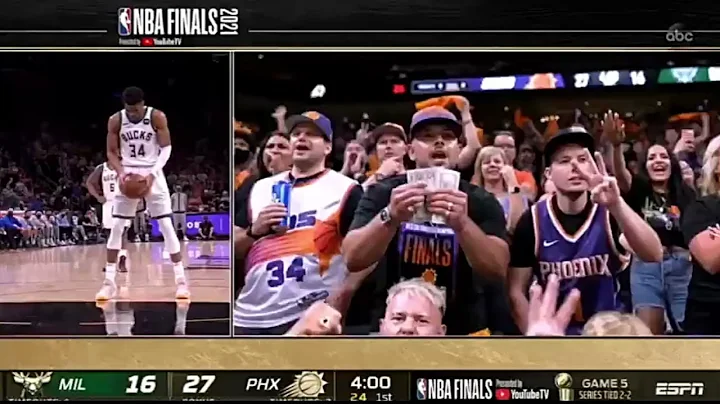PHX Suns fan flashes $100 bills as Giannis shoots a pair of free throws
