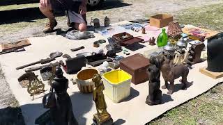 Sarasota Flea Market. JC selling marbles and license plates. 