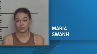 Woman charged with murder in Russell neighborhood shooting appears in court