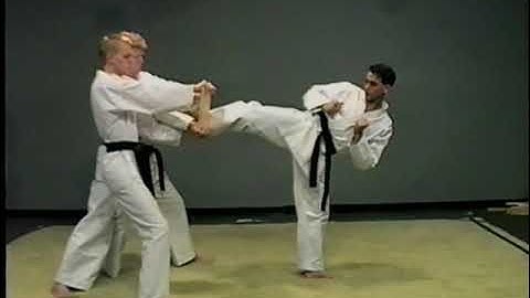 Board Breaking Step behind side kick