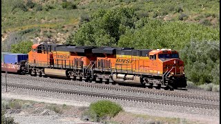 BNSF Climbing double header with containers at Cajon station rounds curve