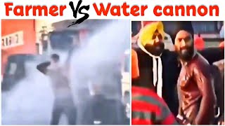 Farmer vs water cannon