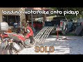 Loading motorcycle onto pickup